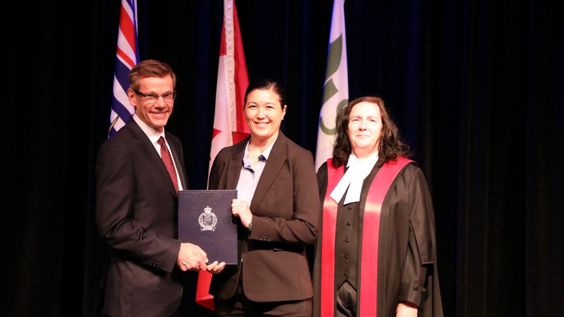 Staff Sergeant Kelly Wong alongside Chief Lipinski and the Honourable Judge Kimberley Arthur-Leung