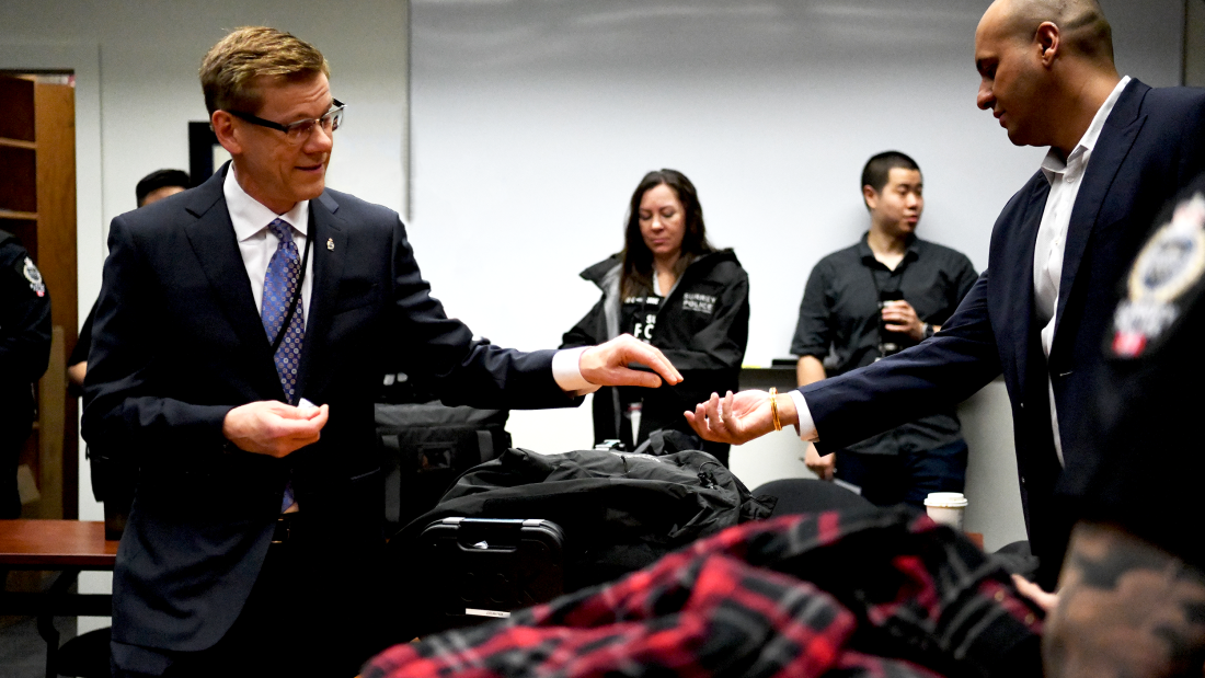 The Chief at a police briefing before officers get deployed 