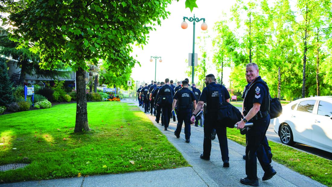 SPS members walking on their first day to be deployed alongside RCMP